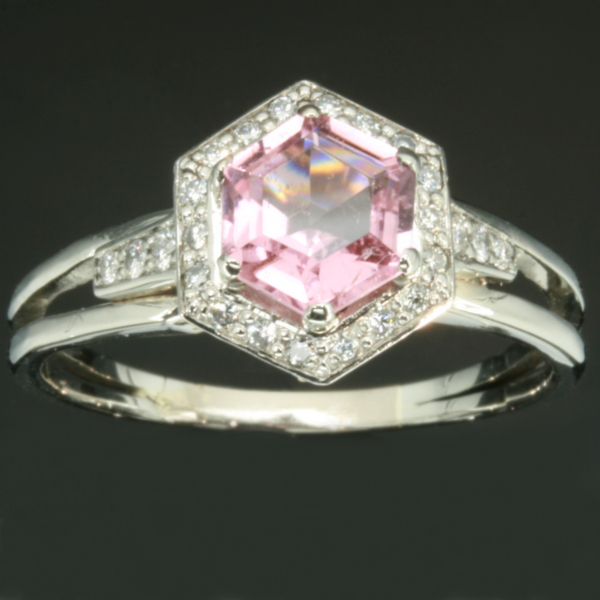 Platinum estate engagement ring with pink topaze and diamonds